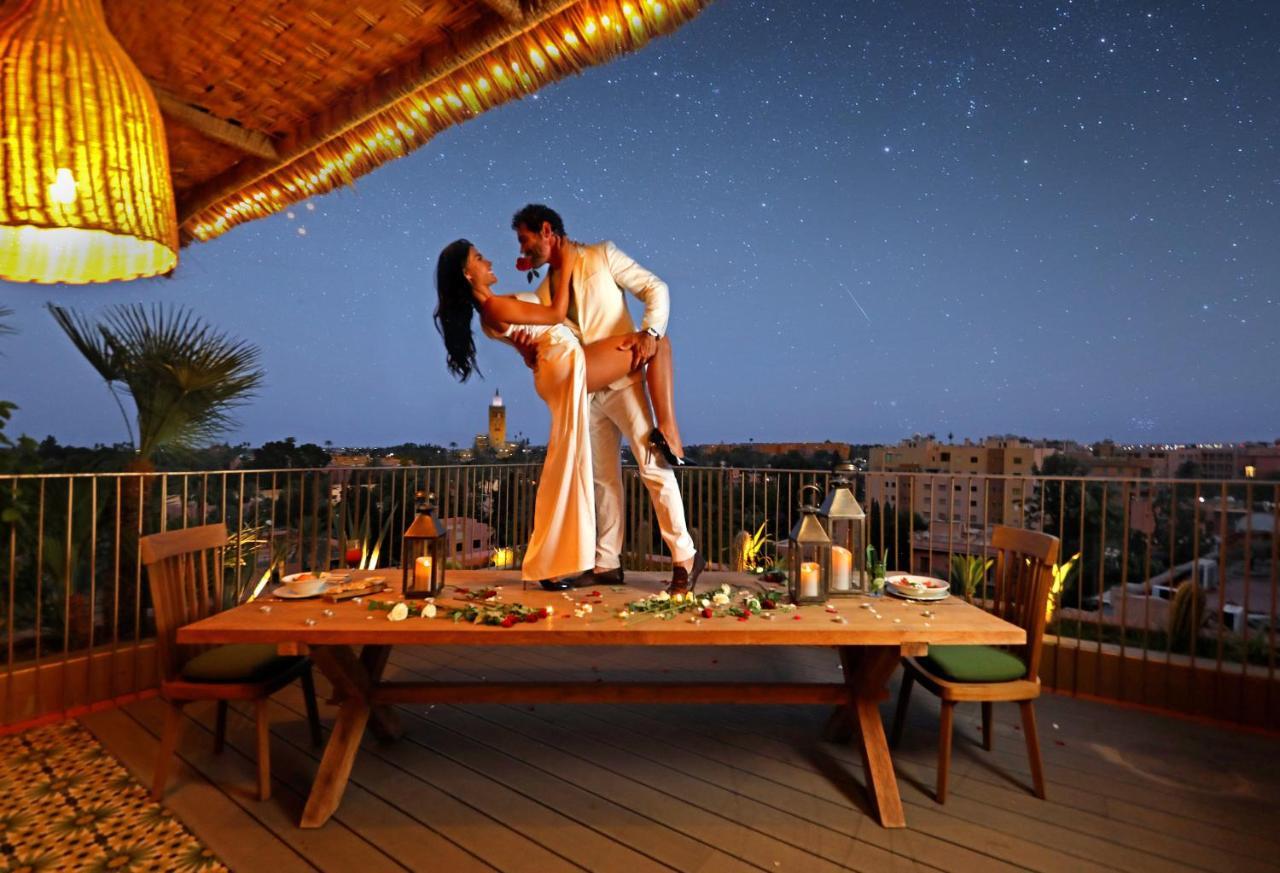 Hotel Jadali & Spa Marakéš Exteriér fotografie A couple dancing on a rooftop